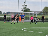 Laatste training S.K.N.W.K. JO11-1JM (partijtje tegen de ouders) van maandag 27 mei 2024 (35/137)